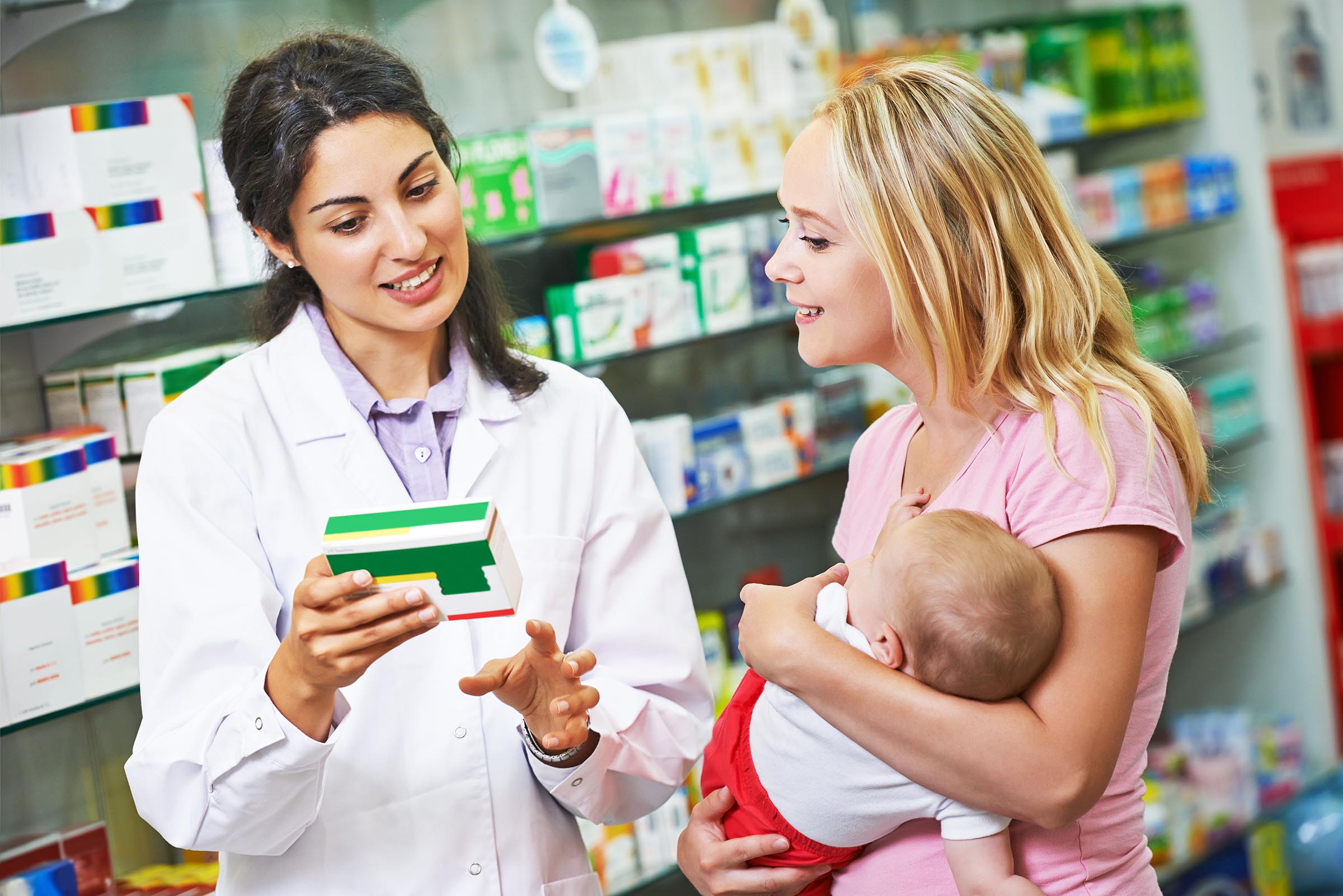 Pharmacy, mother and child in drugstore.